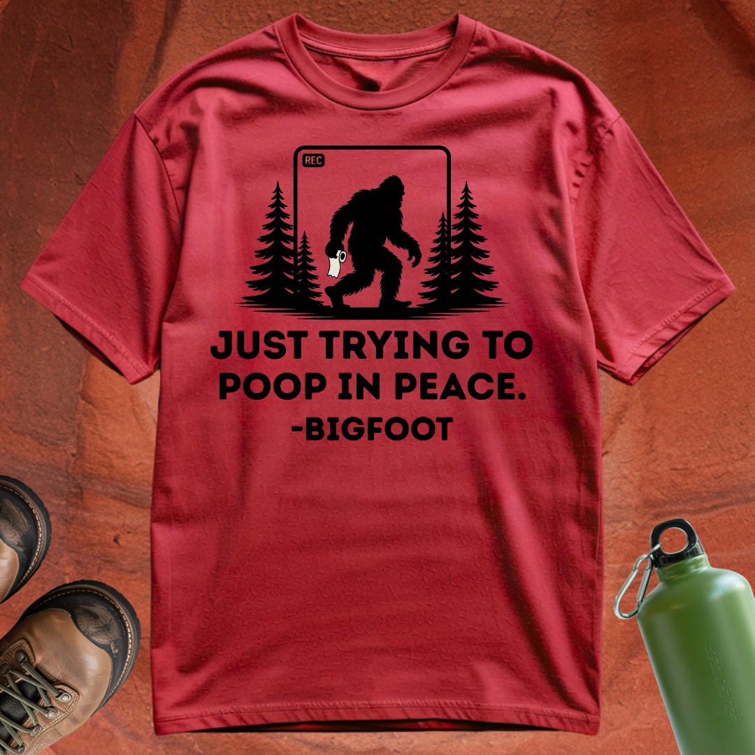 'Just Trying to Poop in Peace -Bigfoot' - T Shirt